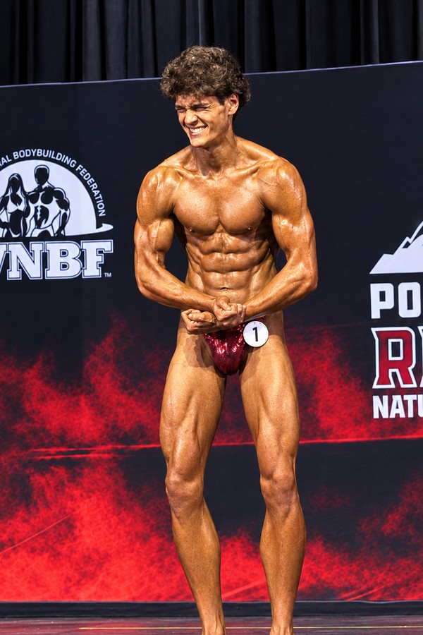 Logan on stage at the Portland Reign Natural Classic