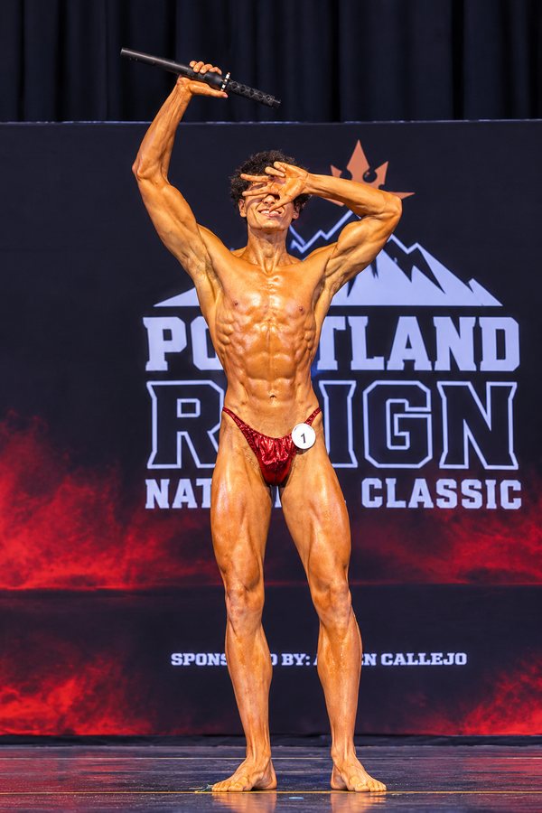 Logan during his posing routine at the Portland Reign Natural Classic