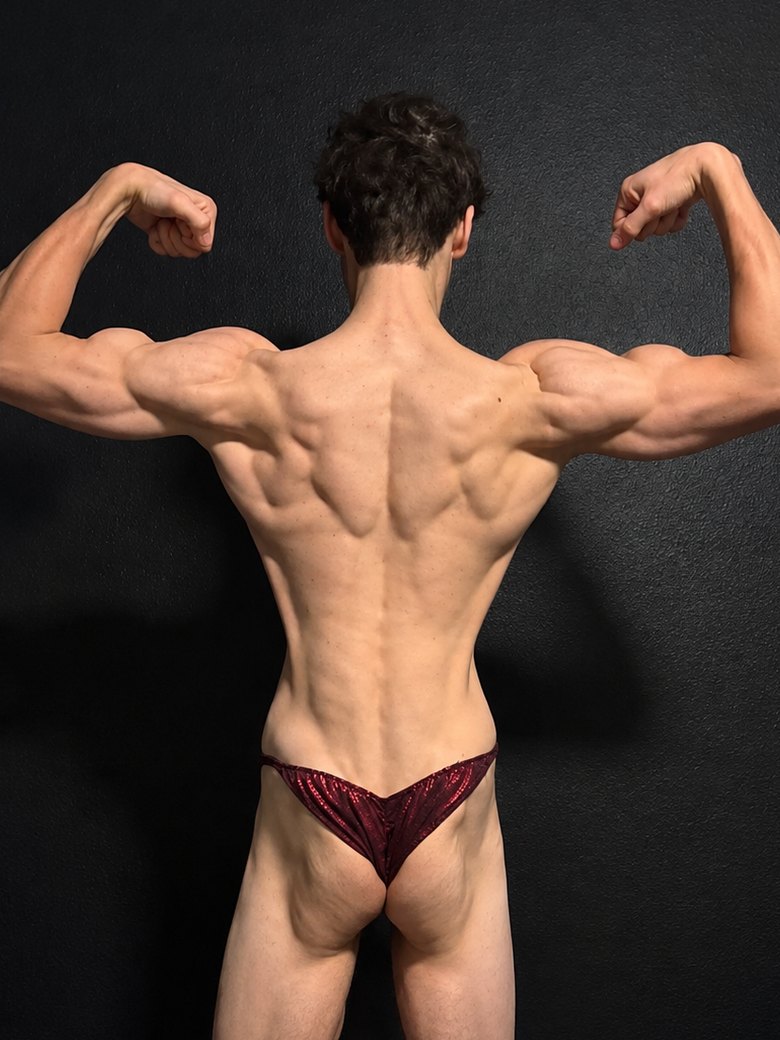 Logan back double biceps after