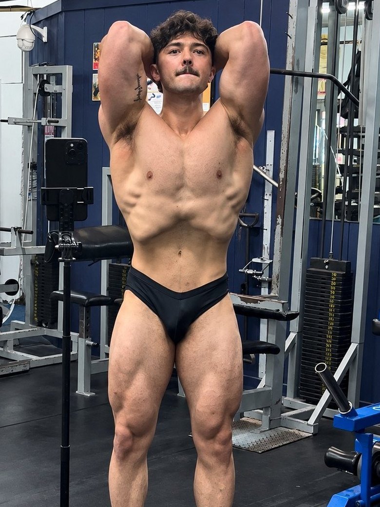 Peyton abs and thigh pose after
